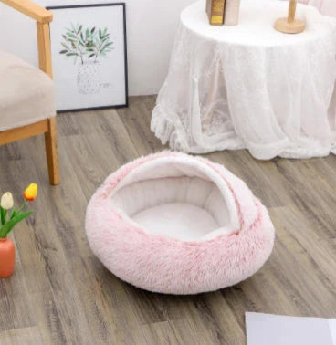 A soft, plush pet bed in various colors, including olive green, brown, pink, and grey, designed for the comfort and relaxation of cats and dogs.