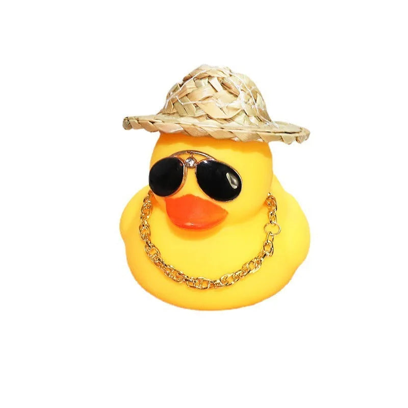 Yellow cartoon duck wearing straw hat car dashboard decoration with adhesive gel and sunglasses accessory