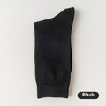 Men's mid-calf length solid colour business socks in combed cotton on a white background.