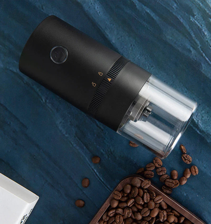 Portable USB-C powered electric coffee grinder with adjustable ceramic burr mechanism for freshly ground coffee