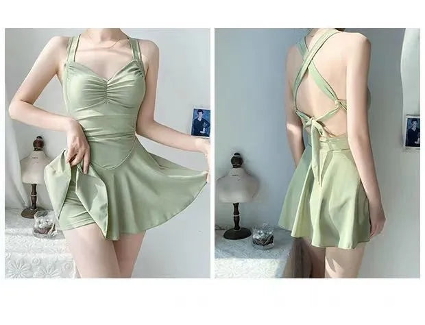 Women's solid colour boxer swimsuit in avocado green with backless conservative design