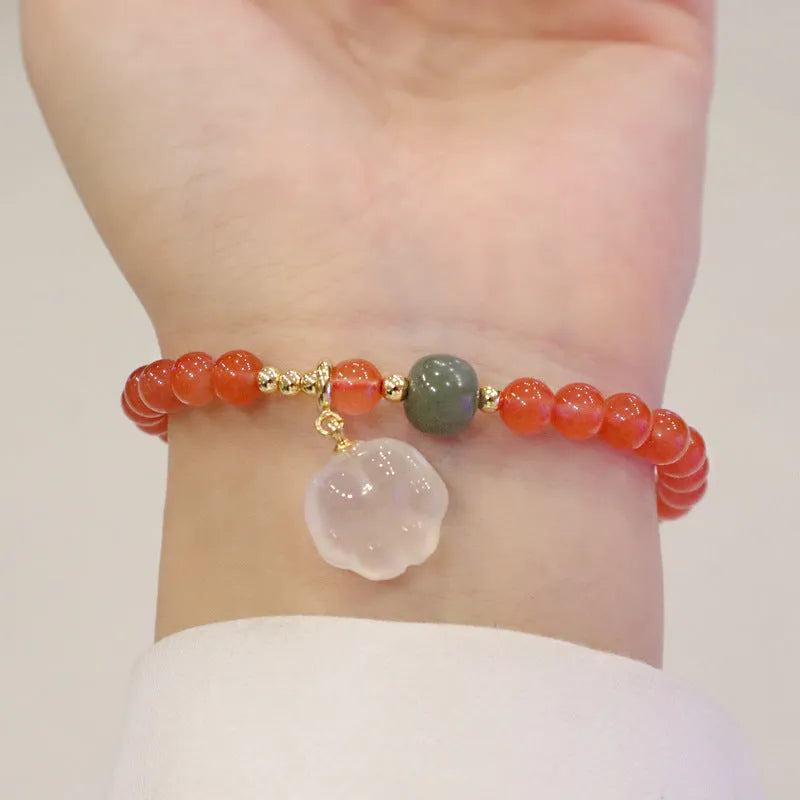 Natural red agate bracelet with cat paw design and jade accent stones