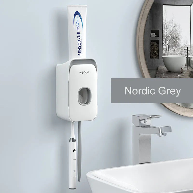 Automatic wall-mounted toothpaste dispenser in blue, grey, or pink ABS plastic with electric pump