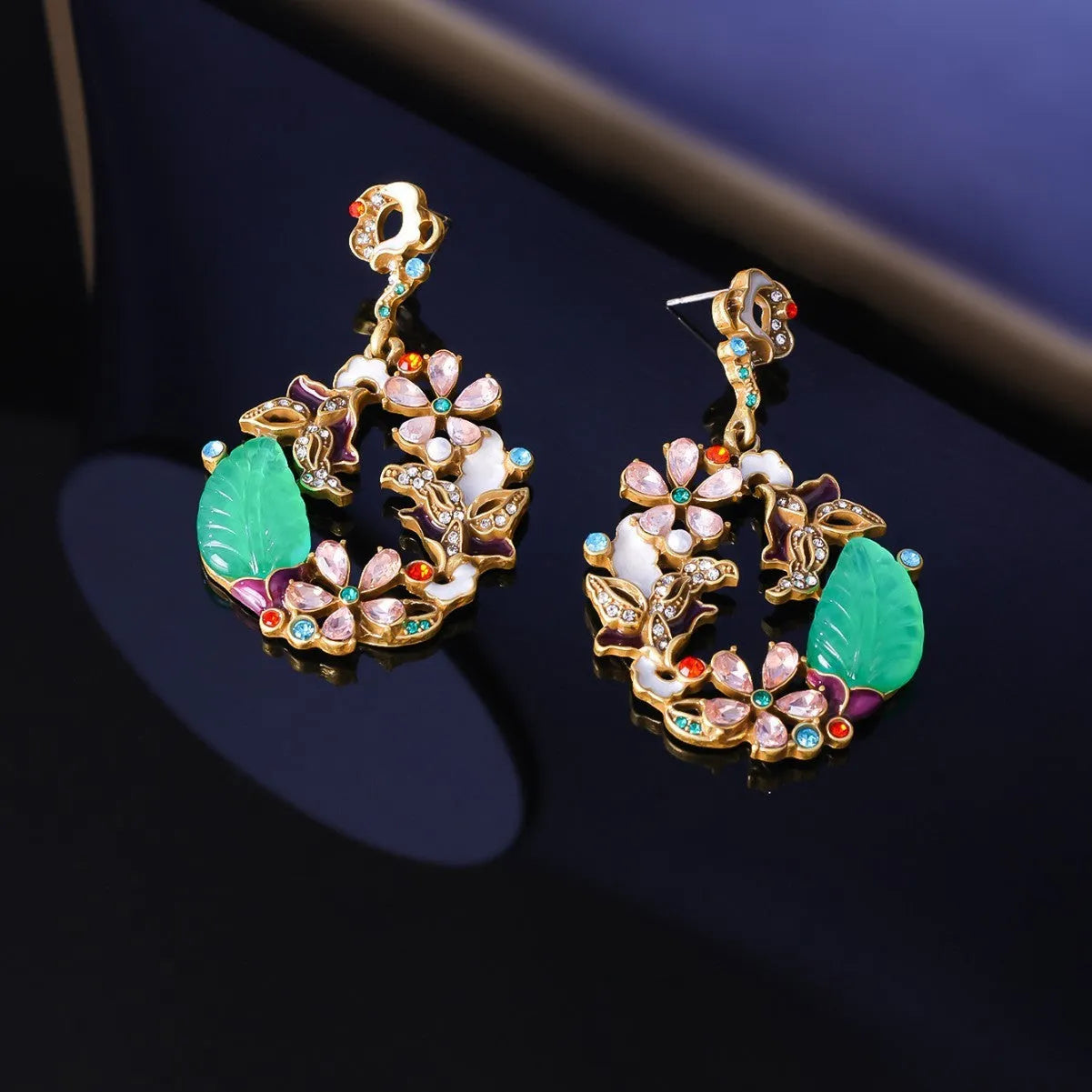 Light luxury distressed alloy earrings with diamond-embedded resin flower and Chinese style garland eardrop design