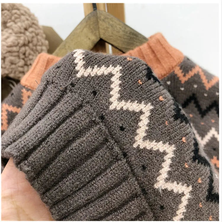 Korean style children's wool sweater in brown colour with long sleeves on hanger