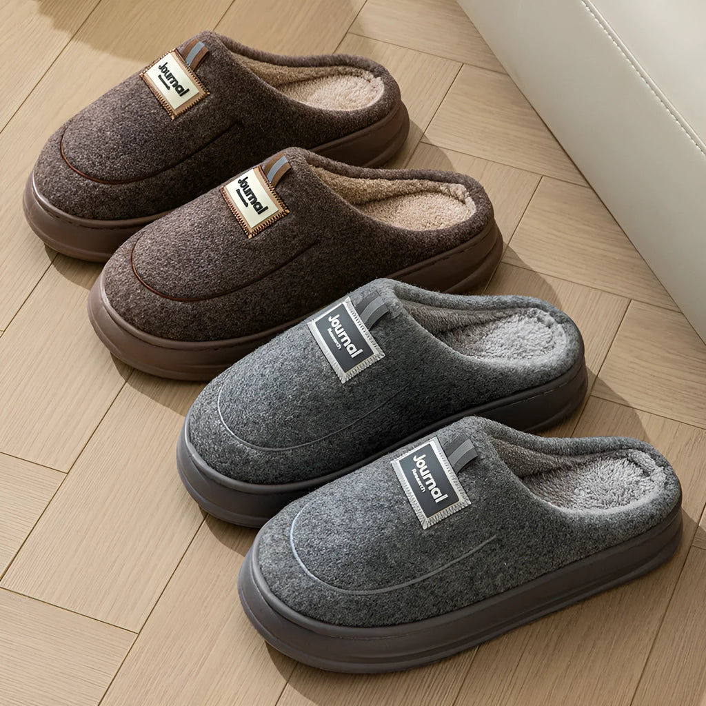 Men's brown thickened cotton slippers with a suede upper and textured sole, shown from the side.