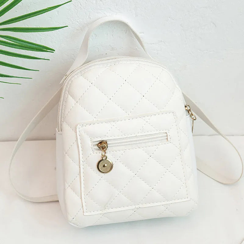 Hard Korean-style backpack with embroidery detail measuring 16x7x19cm in pink colour
