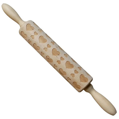 Personalized Christmas rolling pin with a variety of embossed holiday designs, including snowflakes, reindeer, and Merry Christmas patterns