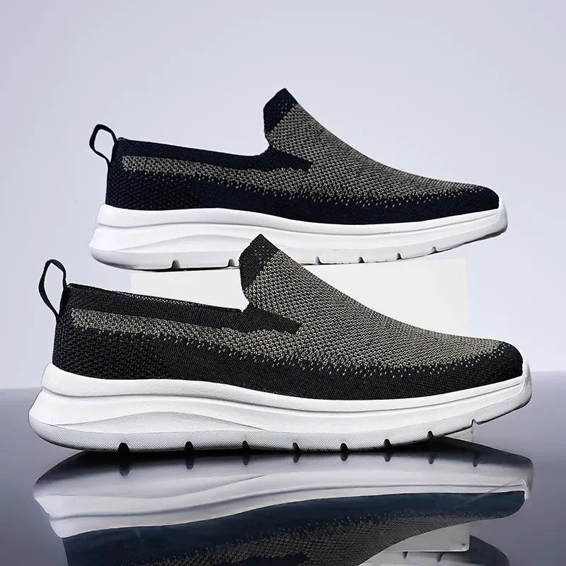Plus size men's mesh trainers, low top, soft rubber sole, available in black grey, dark blue, sizes 39-48.