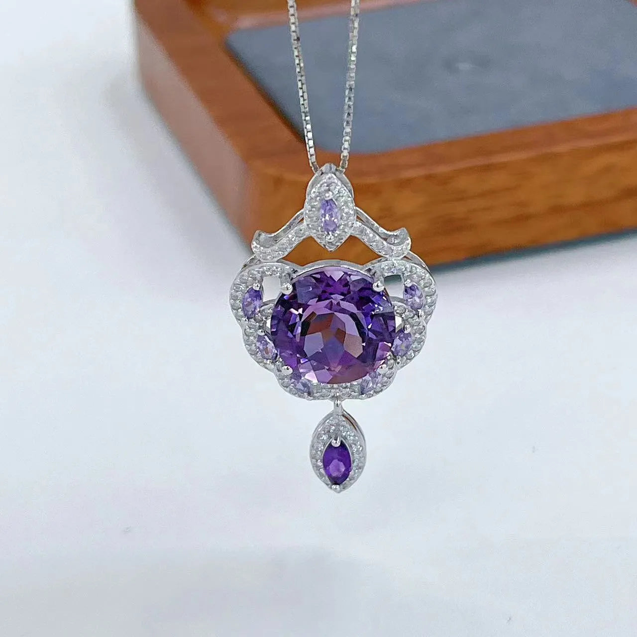 Purple amethyst stone set in platinum-plated silver U-shaped pendant with meteor shower pattern