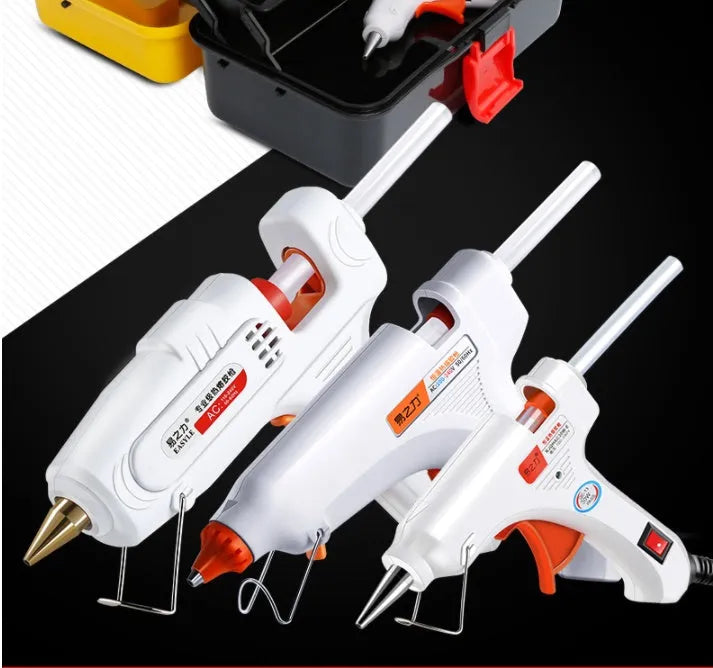 White electric hot melt glue gun with metal bracket stabiliser and anti-heat blanket