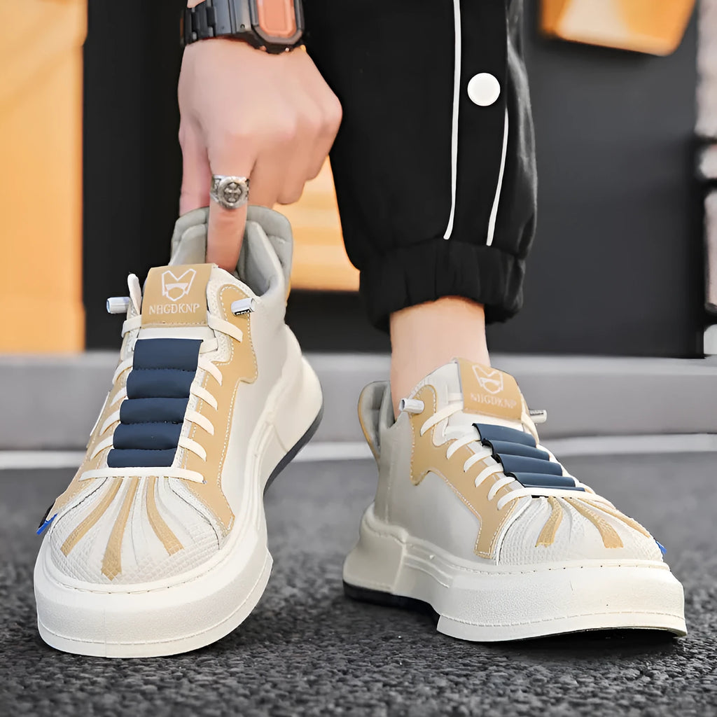 Men's beige low-top sneakers with elastic band closure and leather stitching detail on microfiber upper