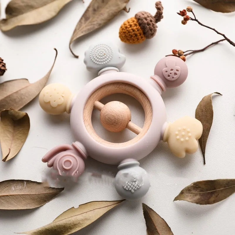 Baby's molars silicone yaoyaole teether rattle toy in pink, edible material for hand sucking prevention