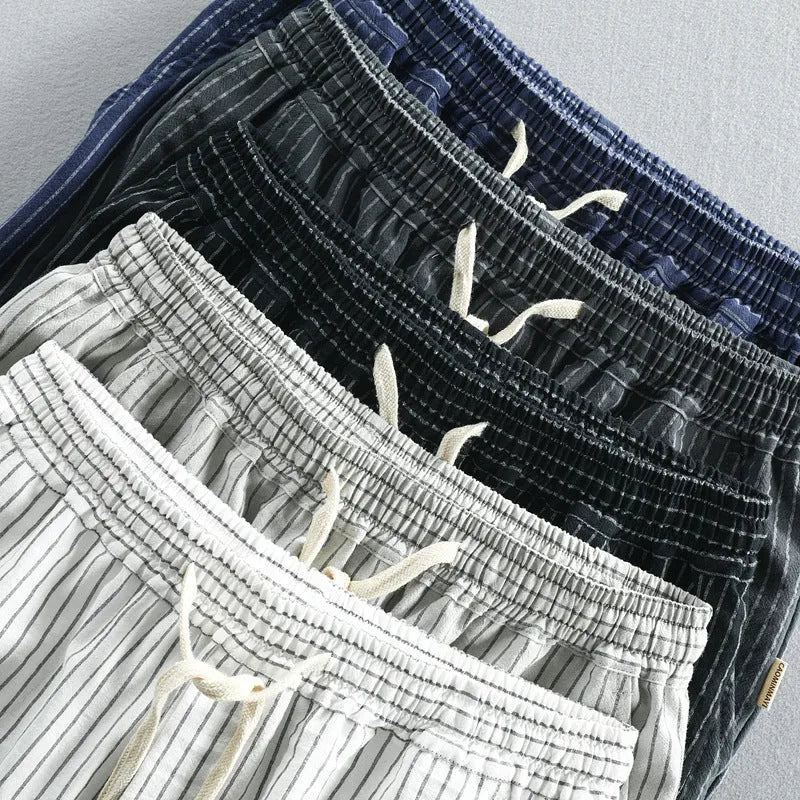 Men's striped cotton shorts with micro elasticity in loose straight fit showing seven colour options