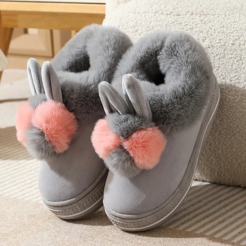 Women's grey plush high-heel winter slippers with a thick, anti-slip TPR sole.