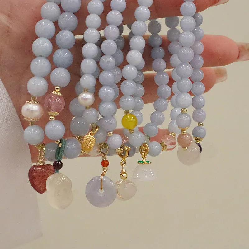 Women's handmade artificial crystal bracelet with gold-plated chain and charm pendant