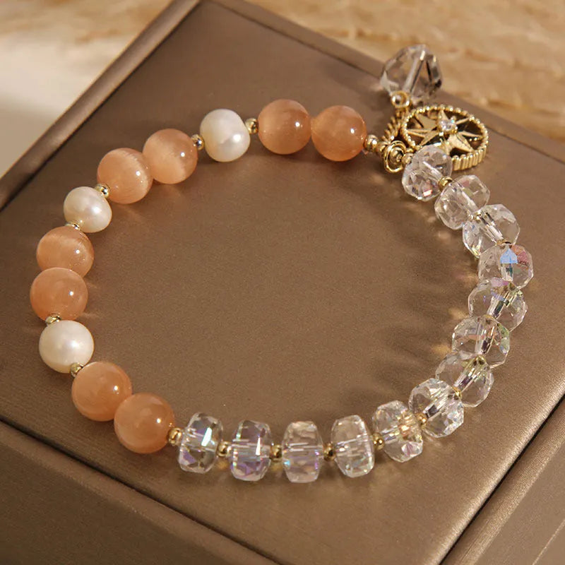 Orange eight-point star opal crystal bracelet with gold-plated settings