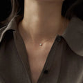 Oval geometric jelly opal pendant necklace with silver plating in gold or white gold colour.