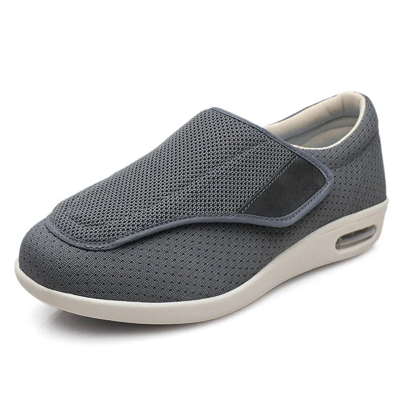Wide fit elderly shoes with Velcro closure, round toe, and cushioned rubber sole in black colour option