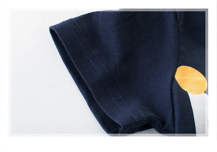 Boy wearing a royal blue short sleeve cotton T-shirt in Korean style, showing front view.