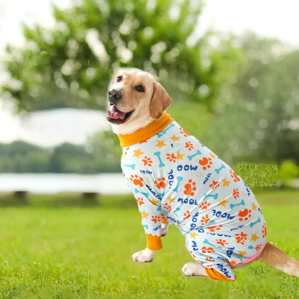 Cotton dog jumpsuit with cartoon print on small dog showing full-body coverage