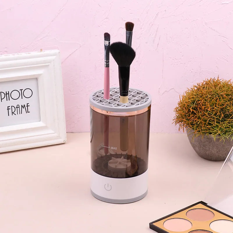Grey and white portable electric makeup brush cleaner with USB charging cable