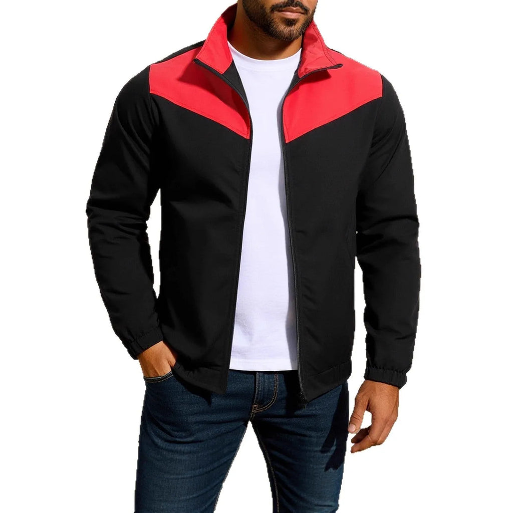 Men's green windproof jacket with a high collar and colour-matched zip, featuring raglan sleeves.