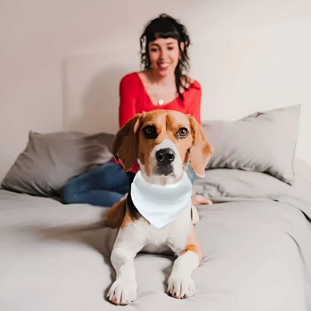 Blank white polyester dog bandana scarf laid flat, showing its triangular shape.