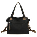 Women's retro style canvas shoulder bag with internal organiser pockets in horizontal square shape