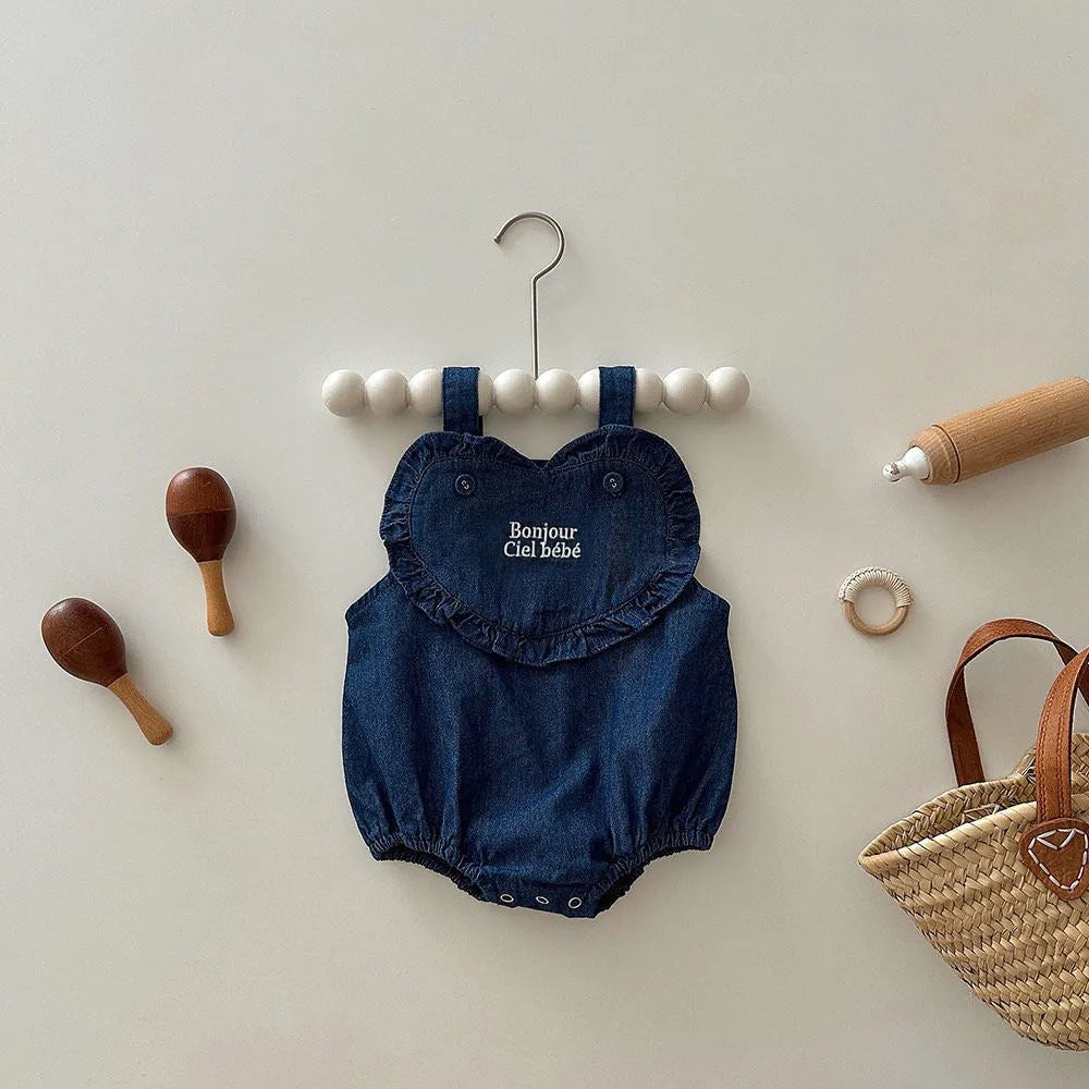 Newborn pure cotton embroidered denim romper in dark blue, sleeveless triangle jumpsuit on white background