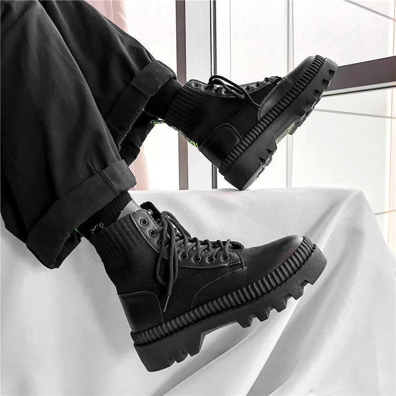 Men's black platform Doc Martens boots with zipper closure and frosted cowhide leather