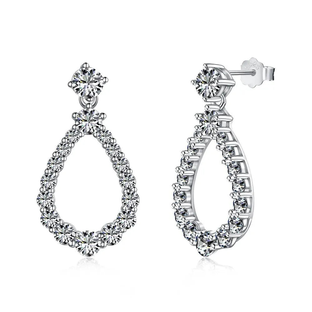 925 silver hollow zircon water drop earrings for women, platinum electroplate finish, 15 x 28.5mm teardrop shape on black background