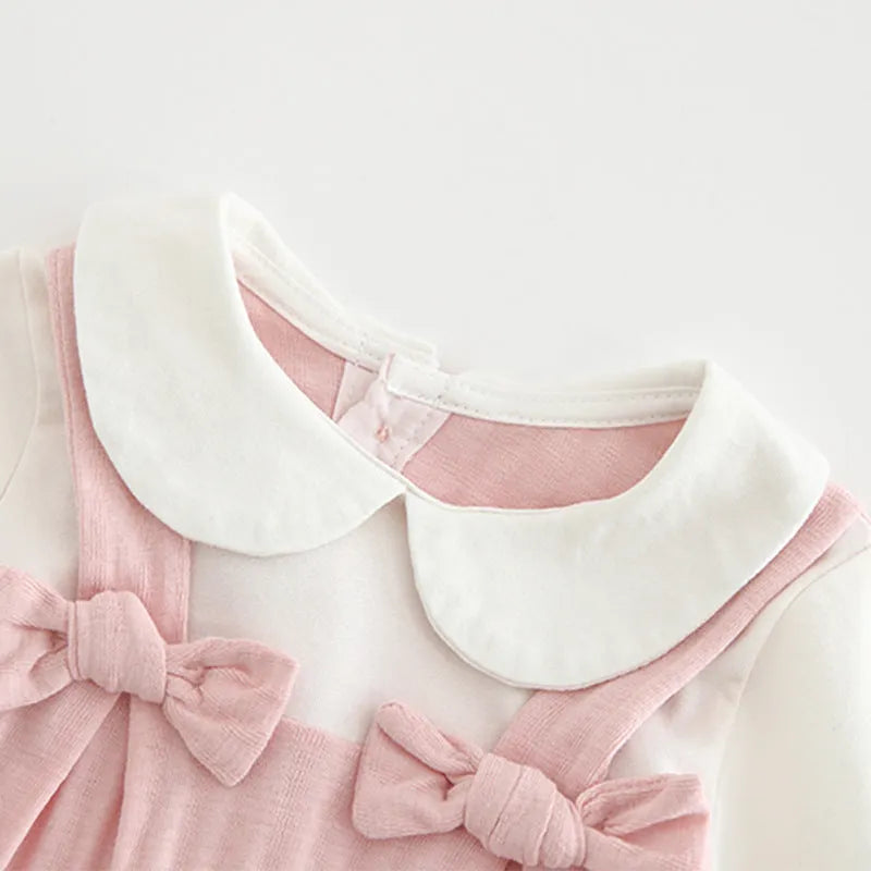 Pink cotton baby girl's long sleeve jumpsuit with single-breasted closure