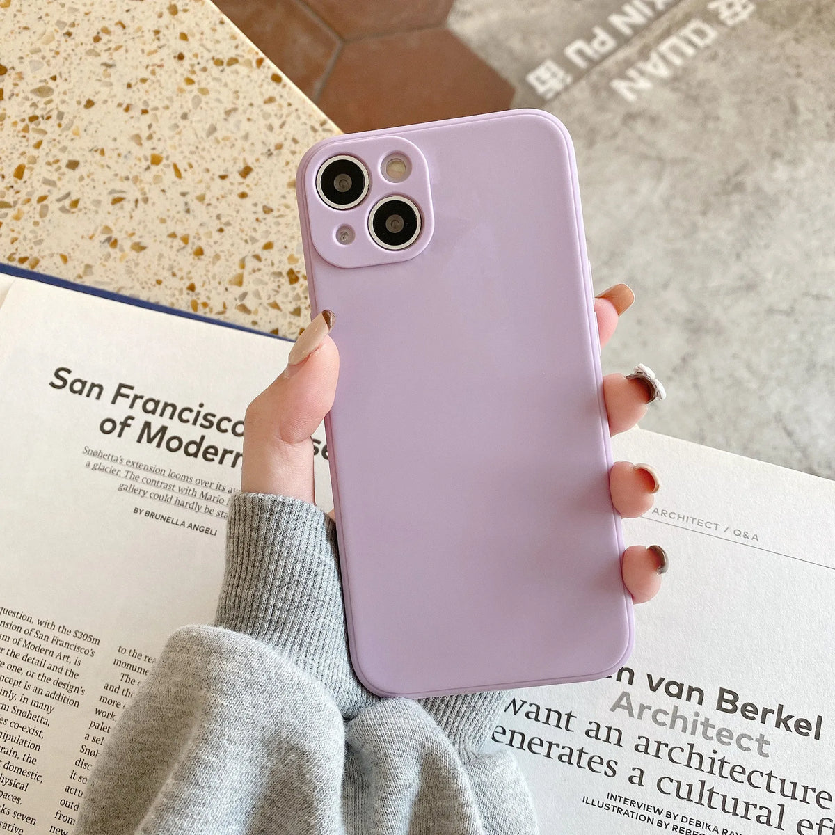 Solid colour TPU iPhone case with straight edges, shown in black, compatible with iPhone 14 and other models.