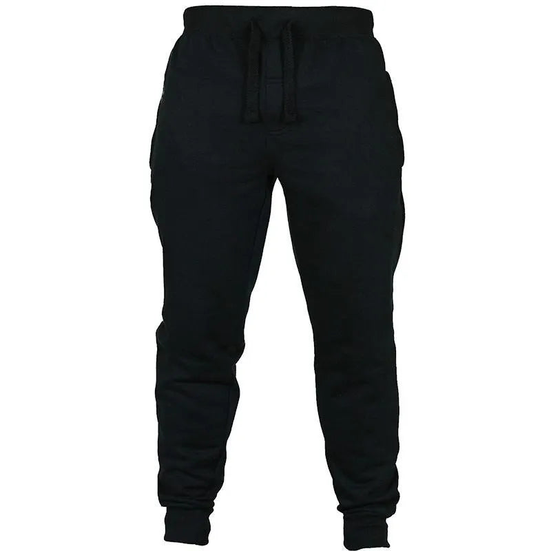 Men's solid colour cotton fleece casual pants with a drawstring waistband in a loose, pencil fit.