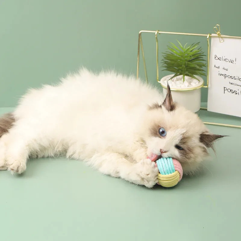 Handmade plush cotton ball cat toy in blue powder, green blue, or pink green colours, 5cm diameter