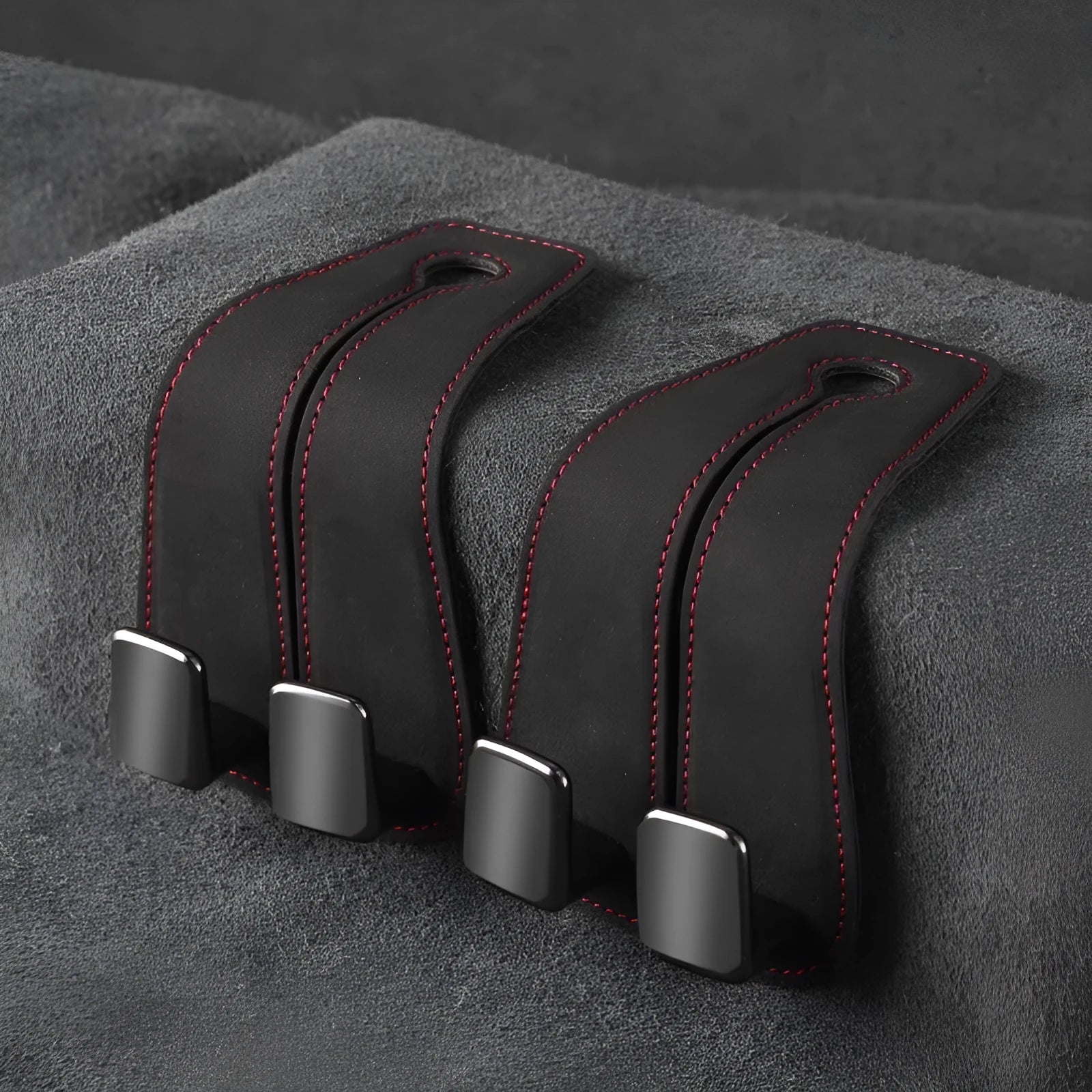 Alloy car seat hook with suede padding in various colour options for vehicle storage