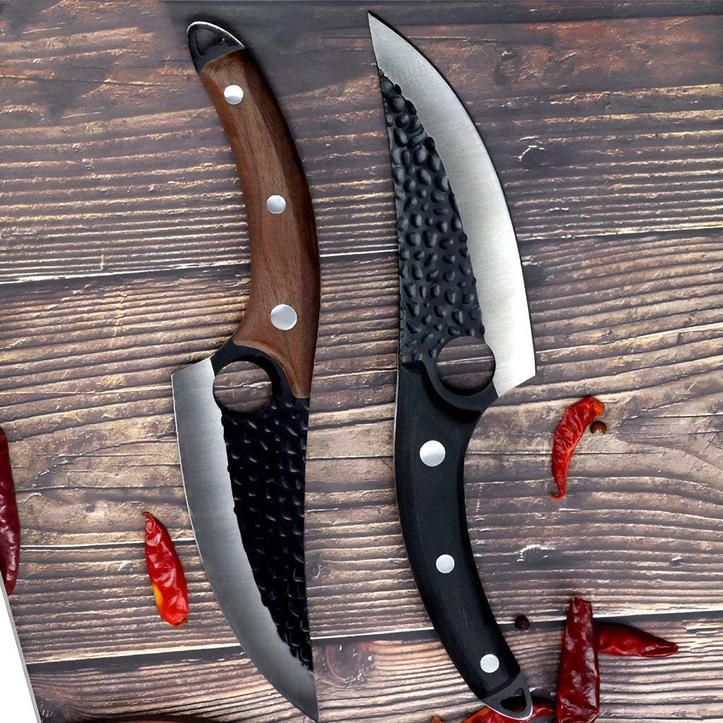 Small scimitar boning knife with hammer pattern finish and black leather sheath on surface