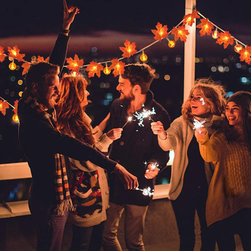 Halloween LED string lights with pumpkin and maple leaf designs, 1.5m 10-light warm white battery-operated decoration