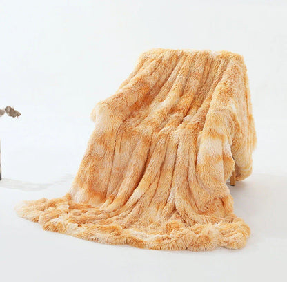 Luxuriously soft and cozy faux fur throw blanket in various colors and sizes