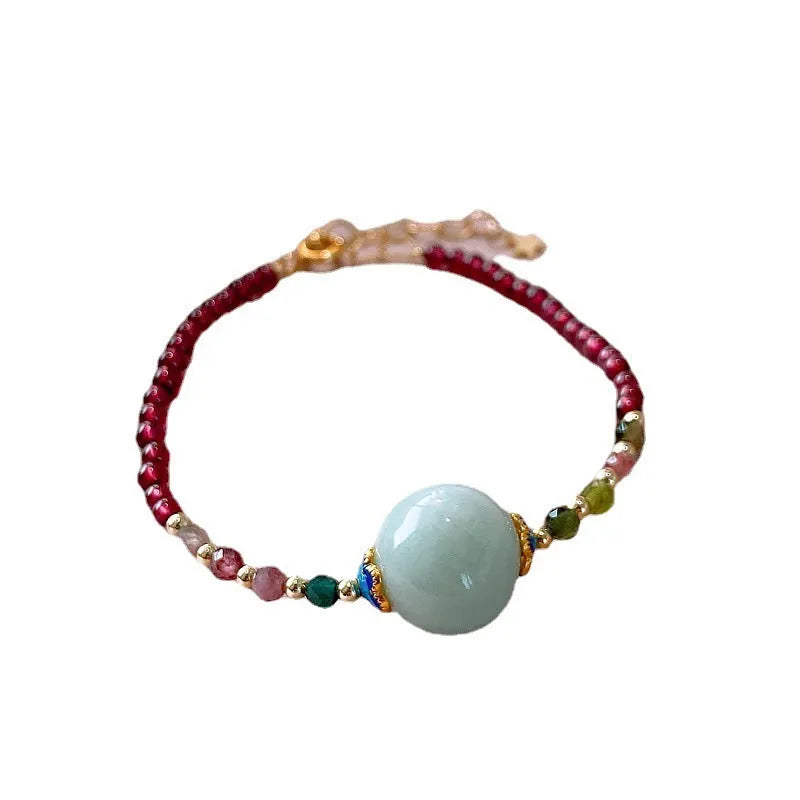 Women's garnet bracelet with aquamarine and tourmaline drop beads in Chinese Korean style design