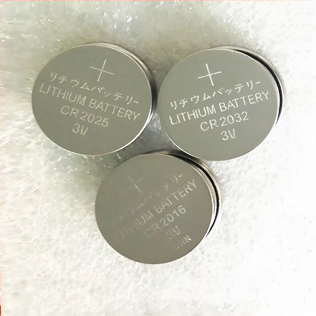Pack of 3V button cell batteries showing CR2032, CR2025, and CR2016 sizes for small electronics.