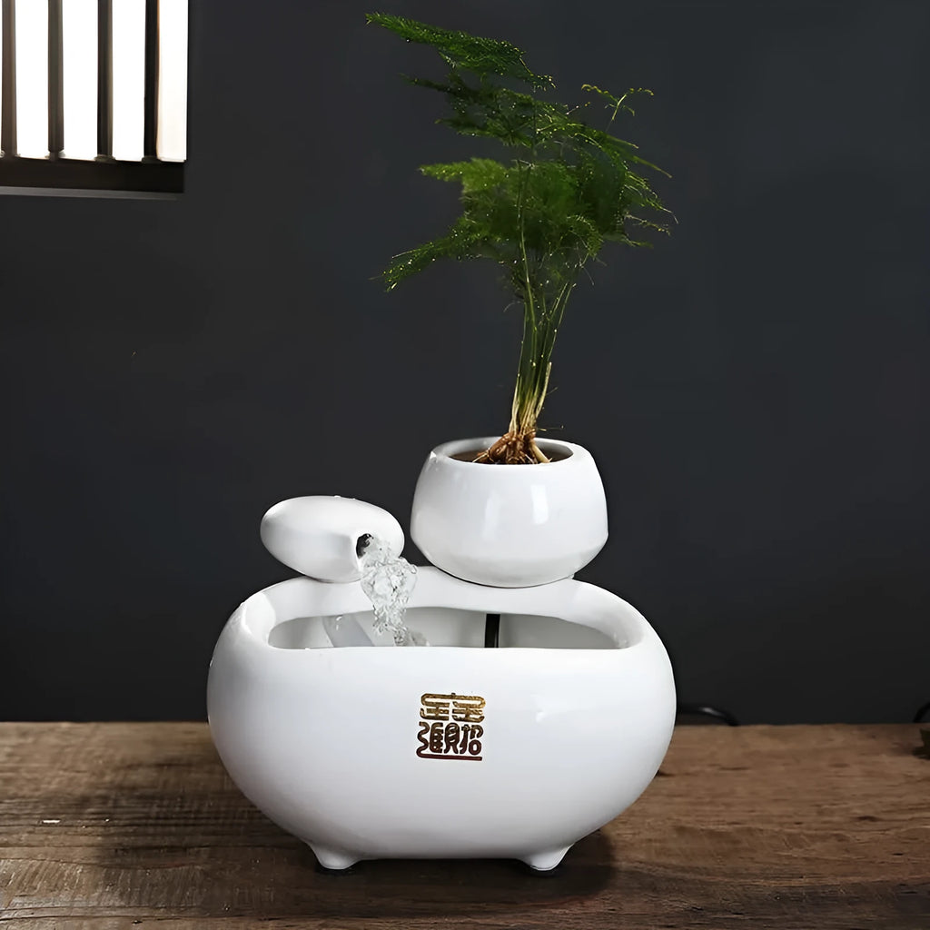 Creative ceramic desktop flowing water fountain ornament with atomizing humidifier in milky white finish