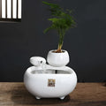 Creative ceramic desktop flowing water fountain ornament with atomizing humidifier in milky white finish
