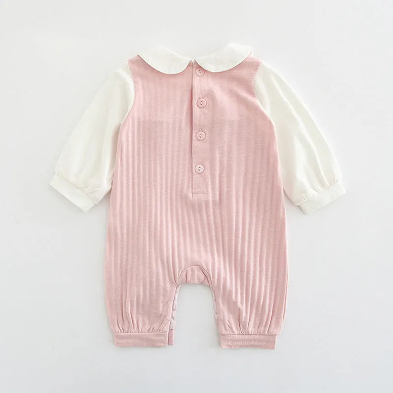 Pink cotton baby girl's long sleeve jumpsuit with single-breasted closure