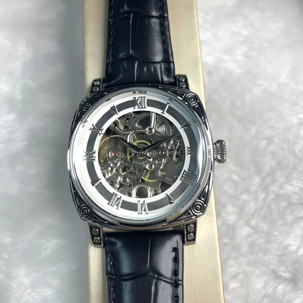 Hollow out business watch with white leather band, round dial, spiral crown, and transparent case back on a white background.