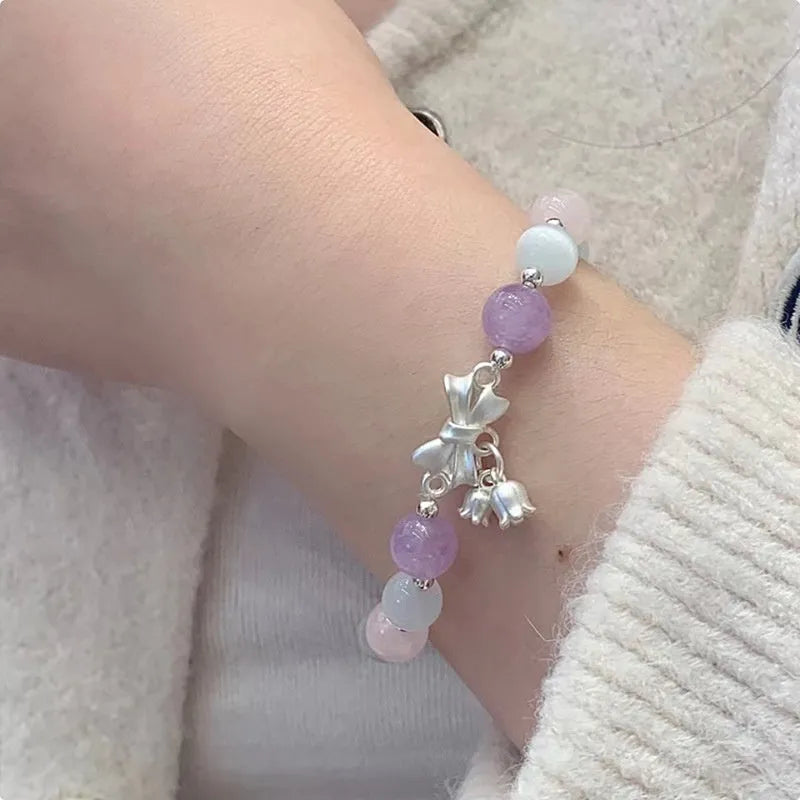 Lavender purple crystal bracelet with bow knot design measuring 10mm