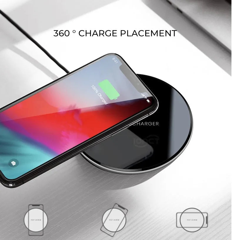 Black QI wireless charging pad with smooth plastic surface and silicone non-slip base