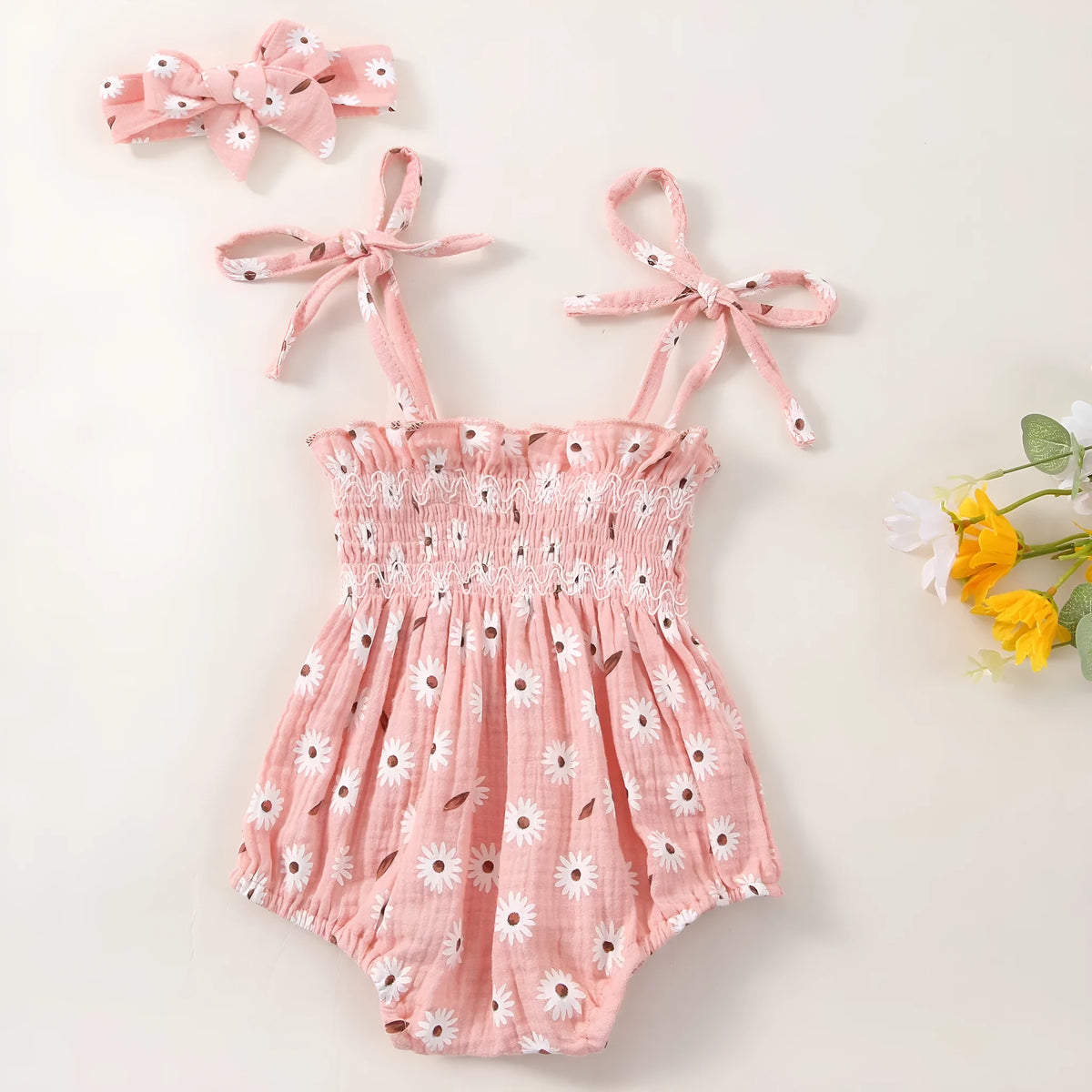 Pink cotton baby girl short-sleeved triangle jumpsuit with bow flower print and matching headband