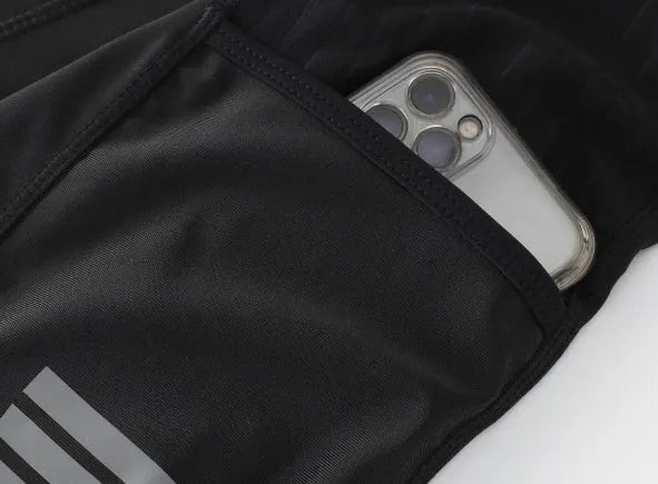 Black shock-absorbing cycling pants with seven-inch length and double pockets for road and mountain biking